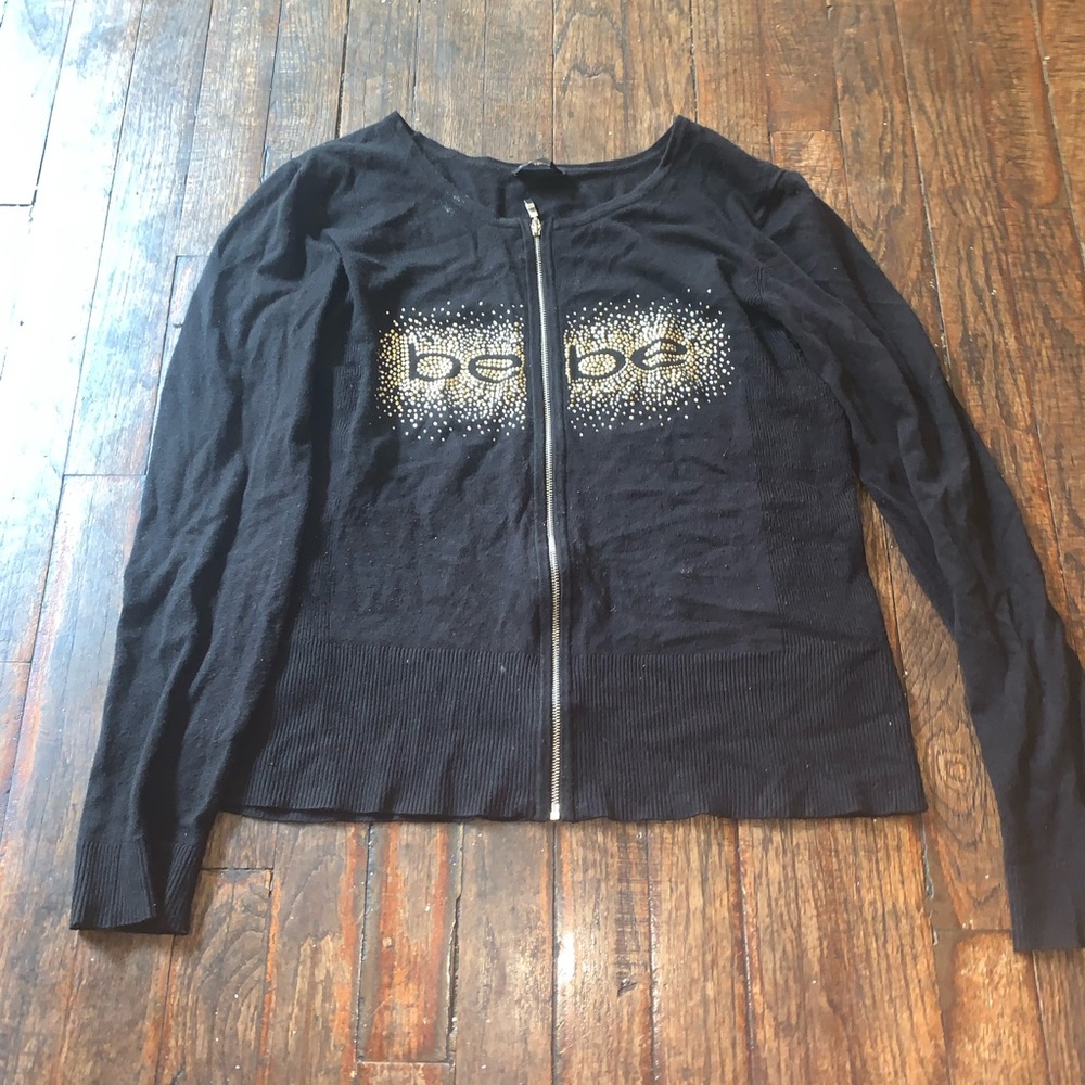 BEBE zip up sweater size medium